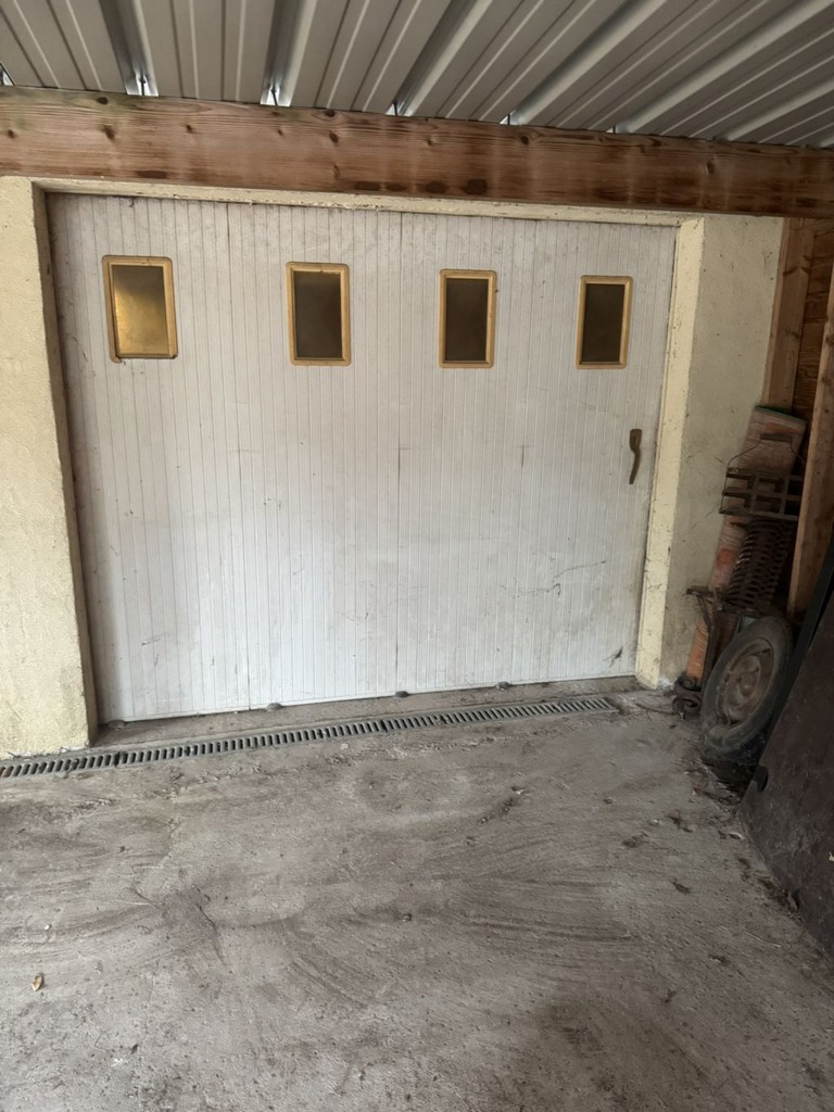 Ancienne porte de garage coulissante