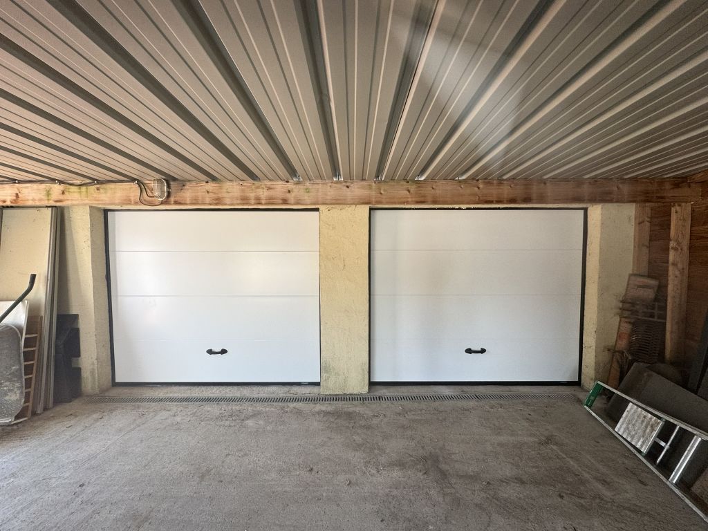 Portes de garage sectionnelles blanches