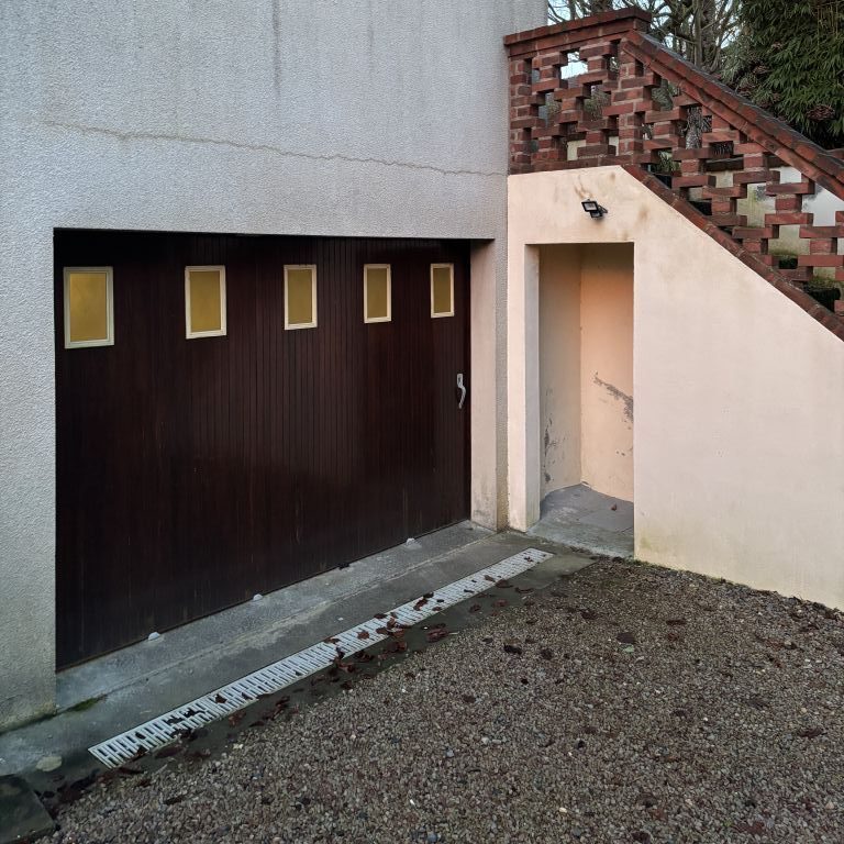 Porte de garage en bois manuelle coulissante